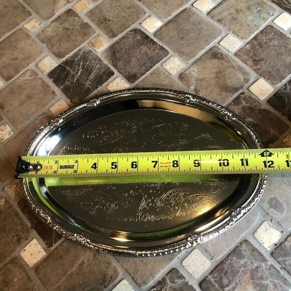Silver Colored Oval Tray 12 inches.    P1 - Picture 1 of 4